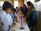 School Students observing the scientiifc wonders